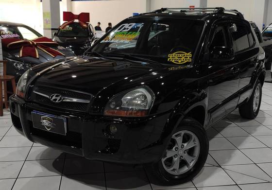 HYUNDAI TUCSON 2.0 MPFI GLS 16V 143CV 2WD GASOLINA 4P AUTOMÁTICO HYUNDAI TUCSON 2.0 MPFI GLS 16V 143CV 2WD GASOLINA 4P AUTOMÁTICO